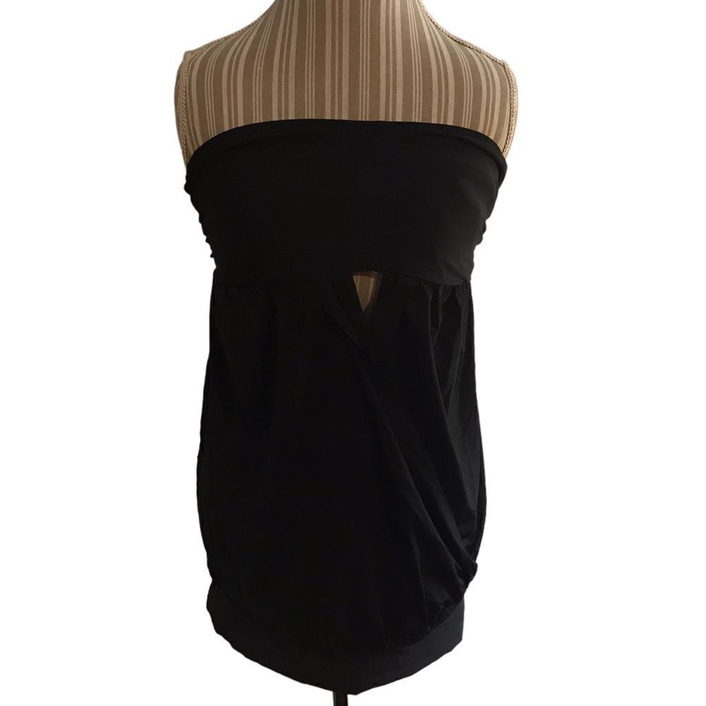 Black Magic awesome top purchased a Miami boutique never worn size XL